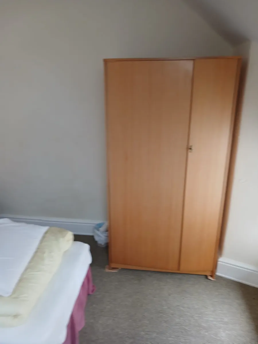 Bedroom before clearance in Kendal