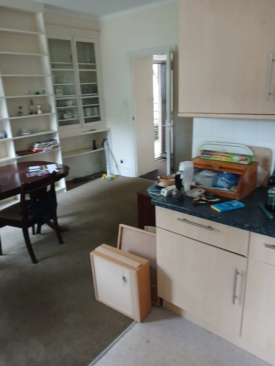 Kitchen before clearance in Arnside